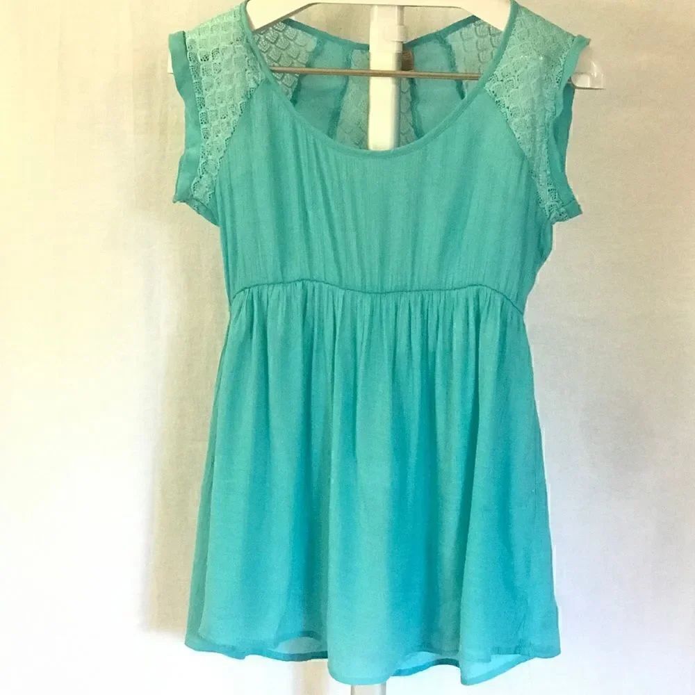 Turquoise Blouse w/ Detail Back Design
